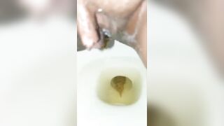 Dirty ebony lady piss and pooping
