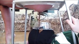 Slave taking liquid poop in his mouth