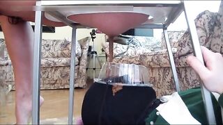 Slave taking liquid poop in his mouth