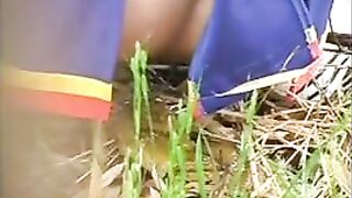 Amateur girl shits outdoor in the grass