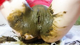 Girl dildo fuck her messy shit covered ass in solo