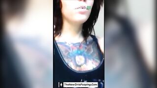 Tattooed chick pooping and pissing in the toilet