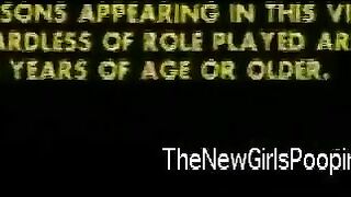 Curly haired MILF pooping on the table