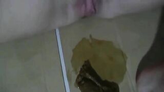 Amateur blonde with big boobs licks her shit