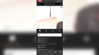 Girl in orange dress squats to take a shit on a bed