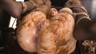 Bondage Japanese chick gets poop covered