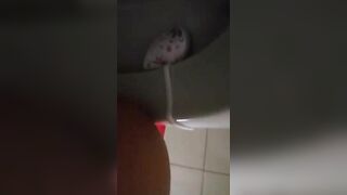 Amateur lady pooping in the toilet for fun