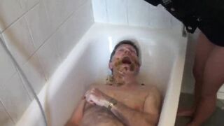 Mistress feeds Slave in the bathroom