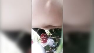 Closeup of sexy lady pooping in the forest