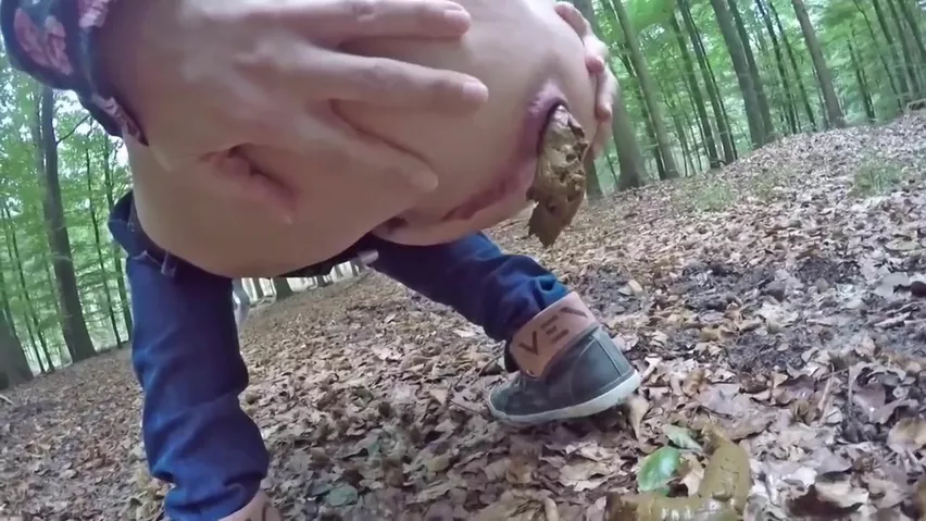 Dry turd pooping in the forest
