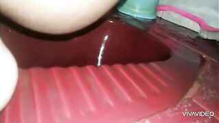 Amateur lady pooping in the toilet