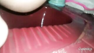 Amateur lady pooping in the toilet