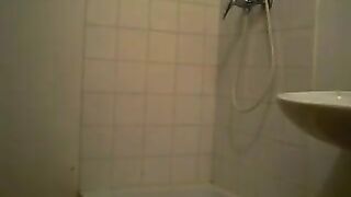 Sexy chick in the shower panty pooping