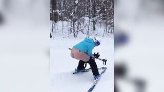 Naughty girl ski pooping in the snow