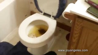 Naughty amateur lady pooping in the toilet