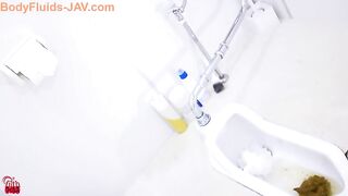 Japanese beauty in high heels pooping in the toilet