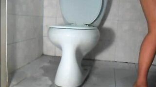 Chubby ass poops messy load