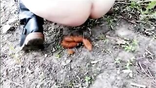 Girl shitting outdoor in the forest