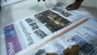 Big black ass bitch pooping on newspaper