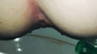 Closeup of big booty lady pooping