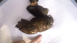 Mega booty girl pooping dirty black load