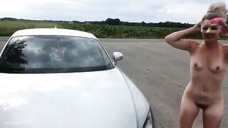 Lady pooping yellow load on her car