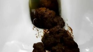 Gorgeous blonde babe toilet poops