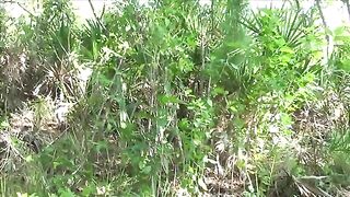 Sexy naught girl pooping in the jungle