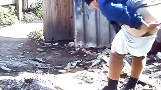 Old woman poops outdoor