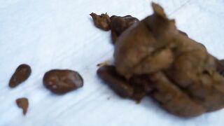 Naughty slut pooping in the locker room