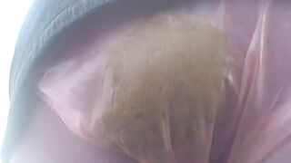 Pooping her sexy plastic panties