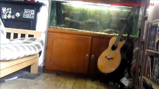 Tall sexy babe pooping in front of her aquarium