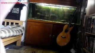 Tall sexy babe pooping in front of her aquarium