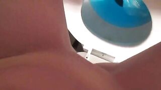 Self-filming her big poop at home