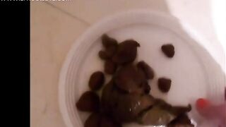 Pooping in her dinner plate