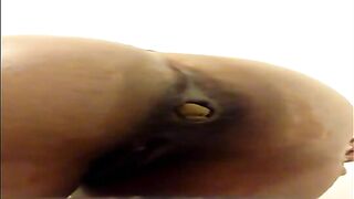 Wife struggles to poop in closeup