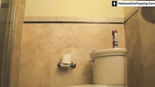 Naked brunette babe teasing and pooping