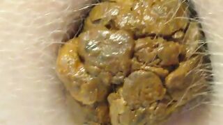 Woman spreads her ass and shows off her shit