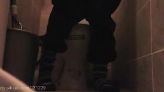 Chubby lady poops in the toilet