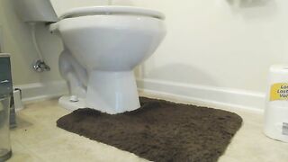 Hot amateur girl poops heavily in the toilet