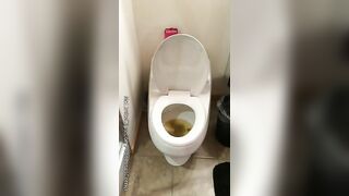 Gorgeous young babe in red dress poops