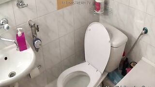 Tattooed brunette hot babe poops in toilet