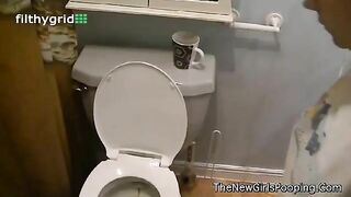 Cute platinum blonde babe poops in toilet