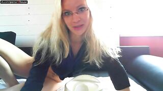 Stunning blonde in glasses pooping in the bedroom