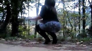 Two stunning girls pooping in the forest