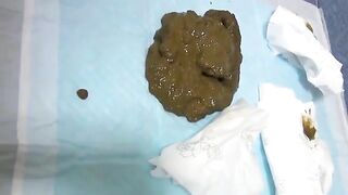 Lovely hot chick pooping messy load