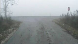 Girls shitting on the rainy road