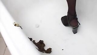 Brunette hottie teasing her pooping hole