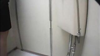 A woman takes a giant shit into a toilet