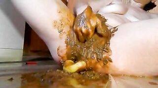 Smearing shit with dildo